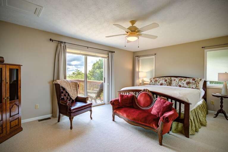 Upper Level King Bedroom with Private Balcony, TV, and Jack-and-Jill Bathroom