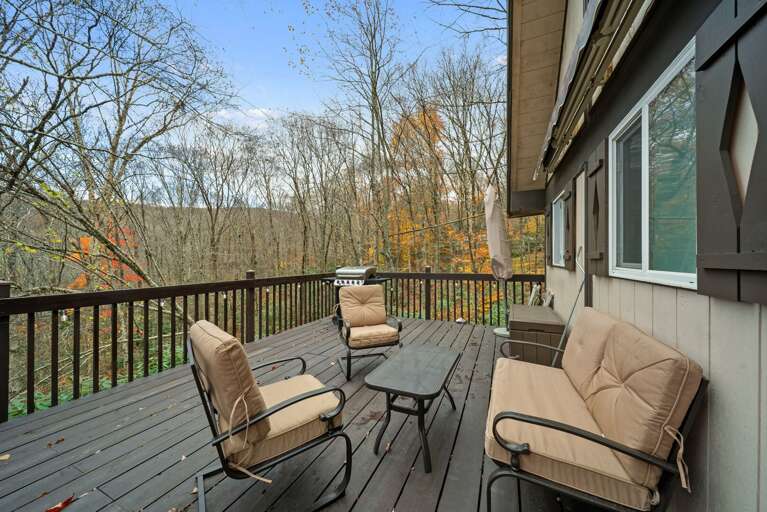 Spacious Deck with Seating and Gas Grill