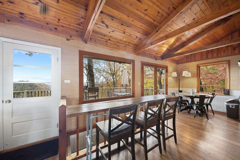 Dining Table and High Top Bar with Natural Light and Views from the Windows