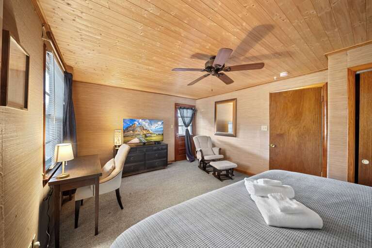 Lower Level King Bedroom with Desk and TV