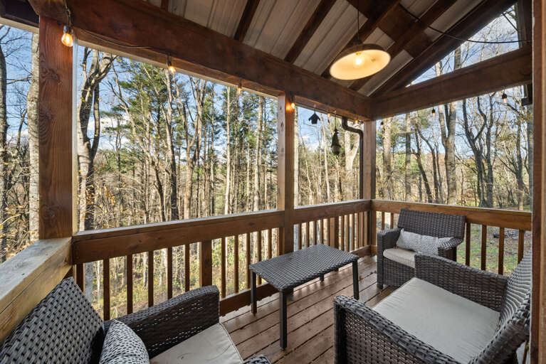 Peaceful Wooded Setting with Covered Deck Seating