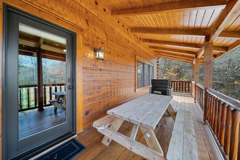 Covered Deck with Picnic Table and Gas Grill