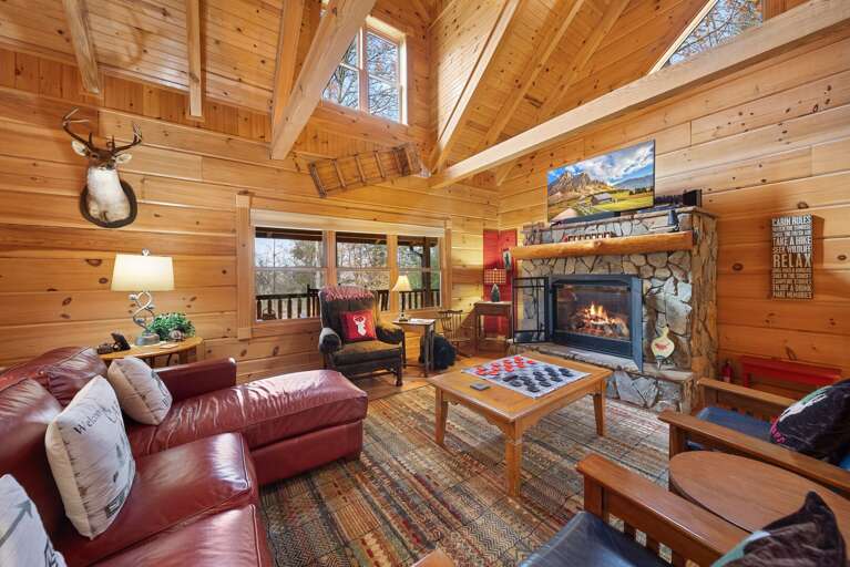 Enjoy Company and Warmth Around the Stacked-Stone Gas Fireplace