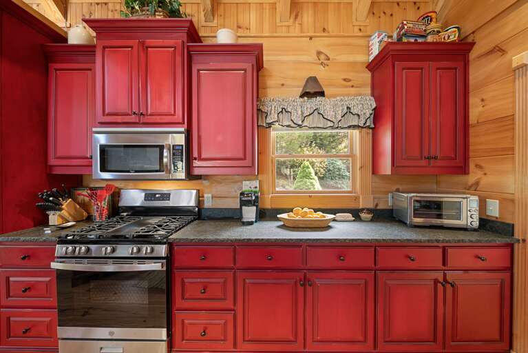 Gas Stove and Custom Cabinets in the Fully Equipped Kitchen