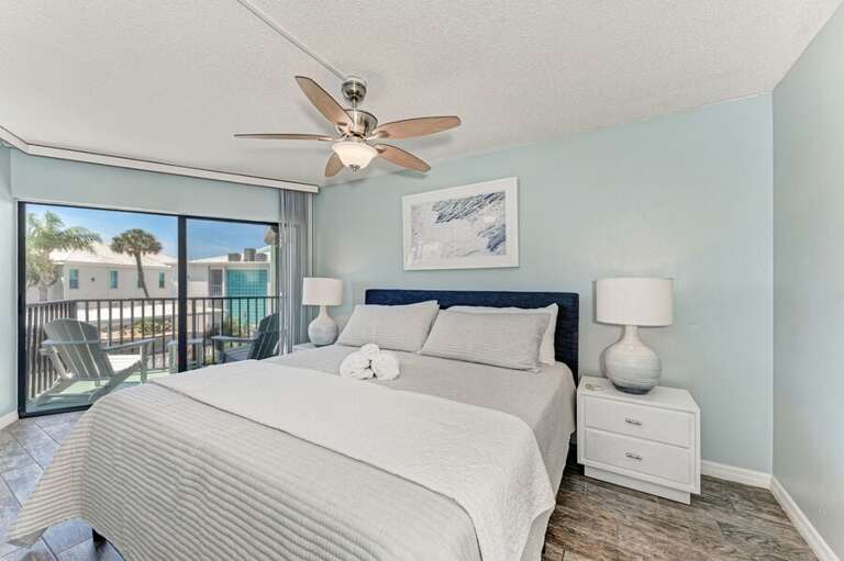 Blue Bedroom Beside Beachy Balcony