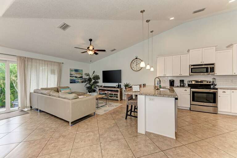 Spacious Living Space Linking Lounge To Kitchen, Light Tiles Underfoot Spacious Living Space Linking Lounge To Kitchen, Light Tiles Underfoot