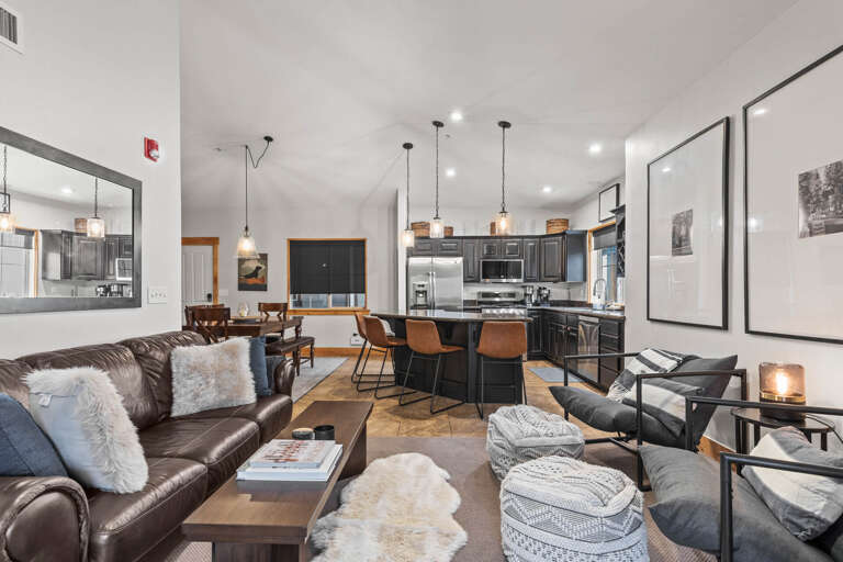 Bear Hollow Lodges 3401: An inviting living room arrangement with a gas fireplace and easy access to the outdoor balcony.