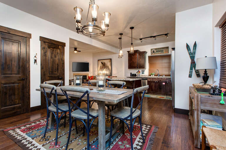 Bear Hollow Ridge 2308: The dining area seats eight at the table and five at the kitchen bar. Plenty of space for everyone to enjoy eating or games as a group Bear Hollow Ridge 2308: The dining area seats eight at the table and five at the kitchen bar. Plenty of space for everyone to enjoy eating or games as a group