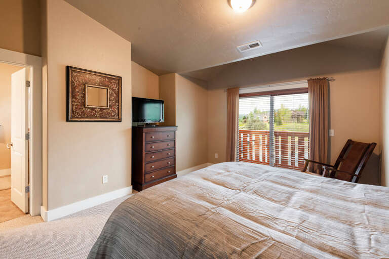 Bear Hollow 5557: Cozy bed on a serene outdoor patio retreat. Bear Hollow 5557: Cozy bed on a serene outdoor patio retreat.