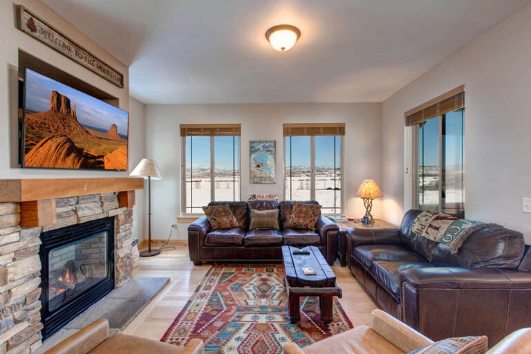 Bear Hollow Village 5639: Cozy space with a sofa set, windows, and a fireplace. Bear Hollow Village 5639: Cozy space with a sofa set, windows, and a fireplace.