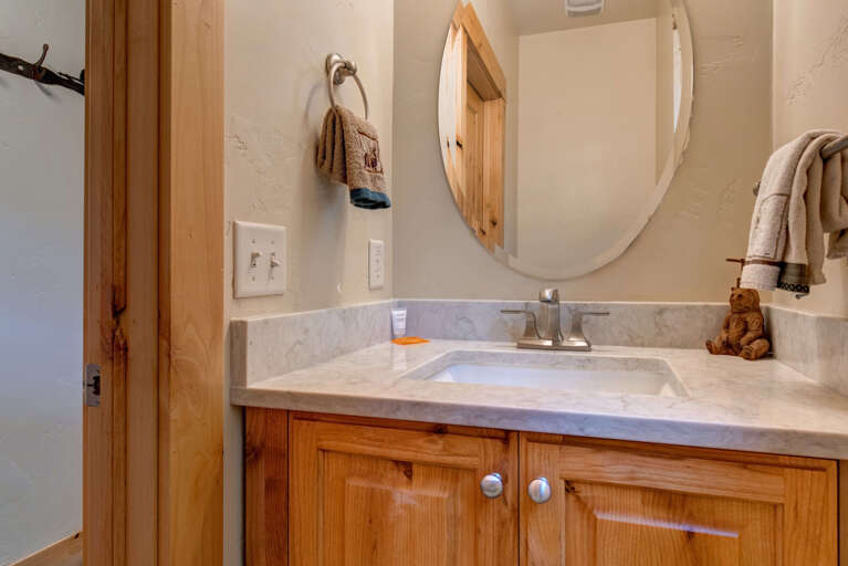Bear Hollow Village 5639: Reflective sink area with a sleek mirror, perfect for morning routines. Bear Hollow Village 5639: Reflective sink area with a sleek mirror, perfect for morning routines.