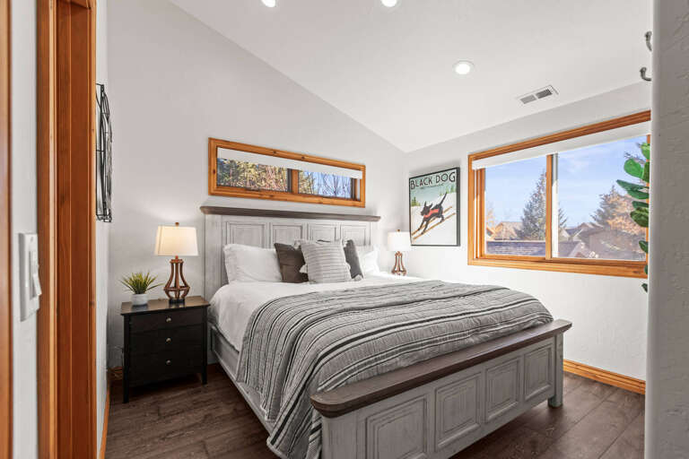 Step into your peaceful retreat, where soft light pours through large windows and cozy textures invite restful nights. You'll wake to beautiful views and unwind in comfort.