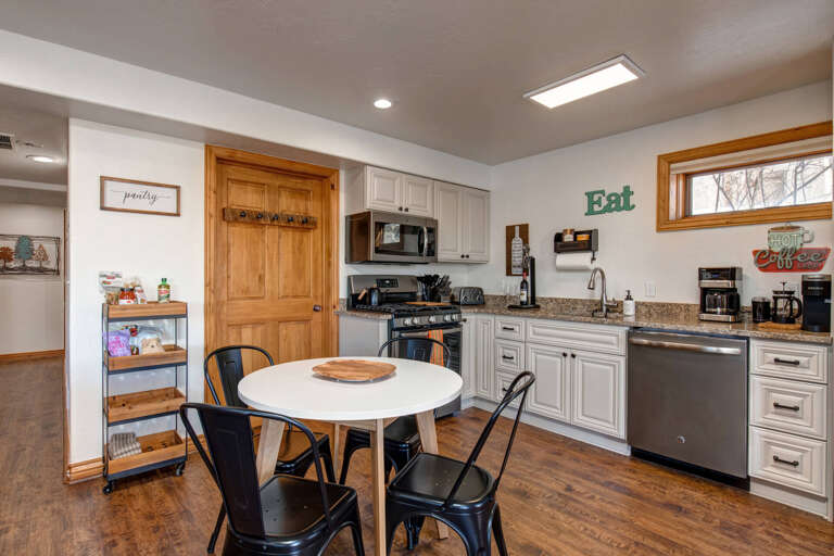 Your fully-equipped kitchen invites you to whip up home-cooked meals with modern appliances, granite counters, and a cozy dining nook—perfect for morning coffee or game nights.