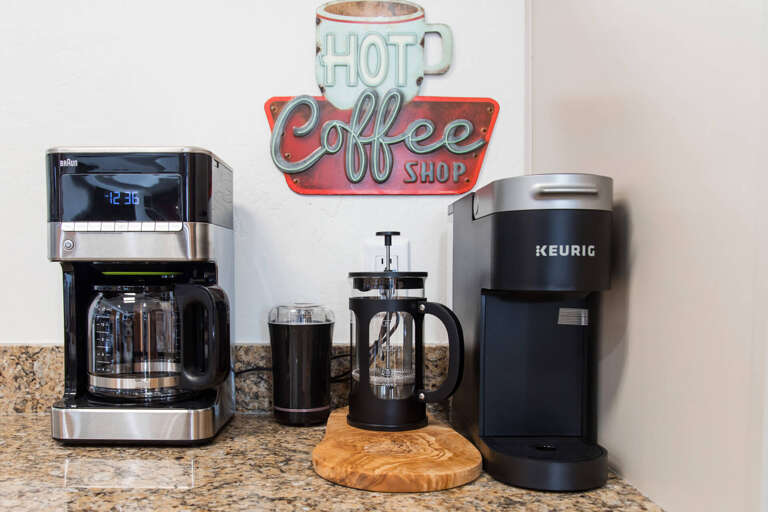 Start your mornings right with coffee made just how you like it, using the Keurig or French press setup waiting on your granite countertop.