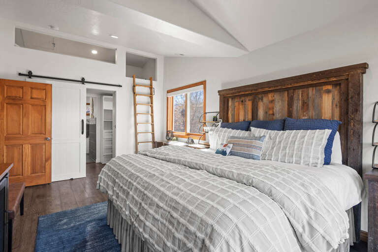 Bear Hollow Village 5534: Upstairs primary King bedroom with full-size bed in loft, desk and 65" Smart TV
