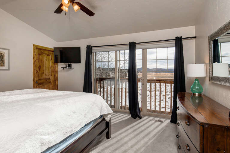 Foxpoint 6195-C2 -  Cozy Bedroom "Sunlight streams through windows, inviting views from the balcony."