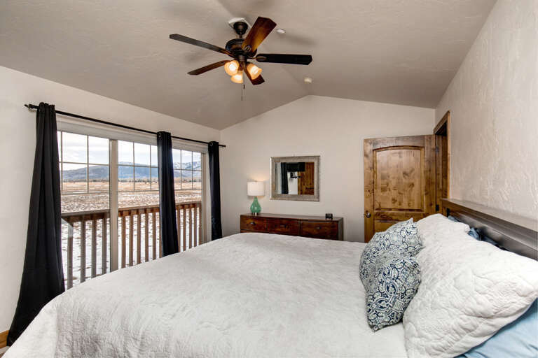 Foxpoint 6195-C2 -  Cozy Bedroom "Sunlight streams through windows, inviting views from the balcony."