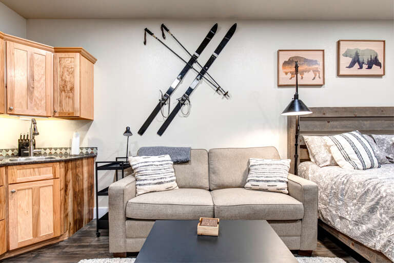 Cozy sofa and elegant center table in a stylish living space. Cozy sofa and elegant center table in a stylish living space.