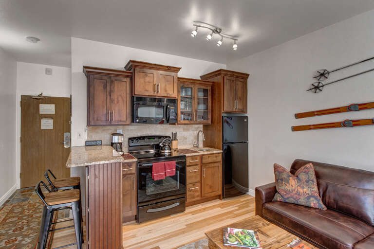 Fully Equipped Kitchen: Modern appliances and ample storage