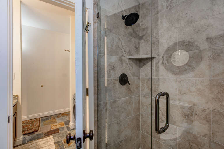 Modern shower with sleek glass enclosure, inviting relaxation. Modern shower with sleek glass enclosure, inviting relaxation.