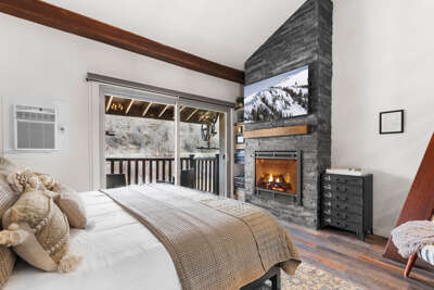 Main floor King bed, stone gas fireplace, 55" smart tv with XBOX