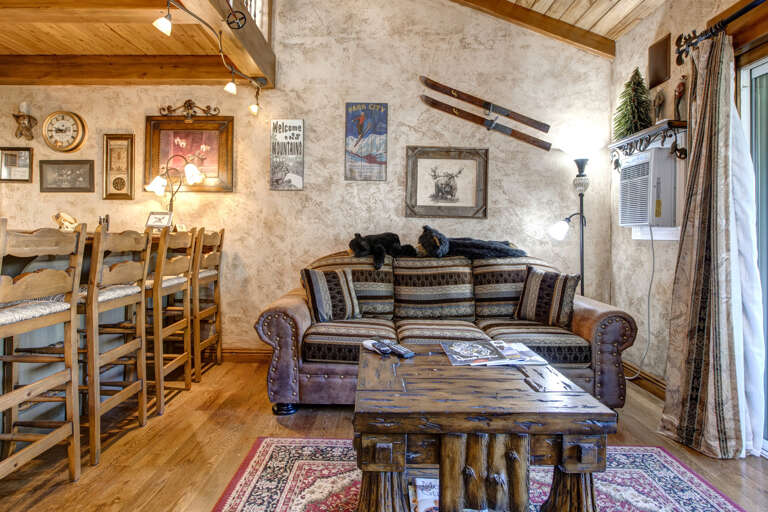 Charming sofa bed and center table leading to the patio Charming sofa bed and center table leading to the patio