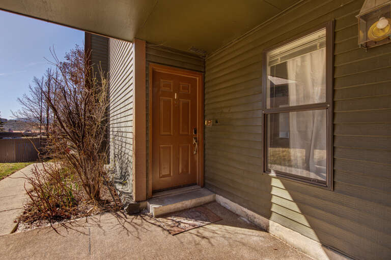 Your private entrance welcomes you to this cozy retreat, set on a peaceful residential street with a small porch for convenient arrivals.