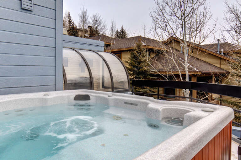 Soak in your private hot tub on the balcony, surrounded by mountain views and fresh alpine air—perfect for relaxing after a day of adventure.