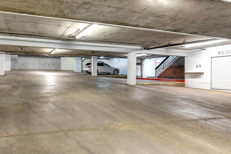 Secure covered parking ensures your vehicle stays protected during your stay, with ample space and convenient access to the property.