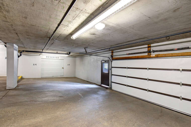 A spacious reserved garage parking space provides secure, convenient access to your vehicle during your stay, with direct interior building access for added comfort.