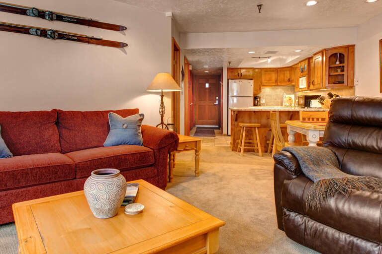 Cozy ambiance with a wood burning fireplace and comfy sofa chairs.