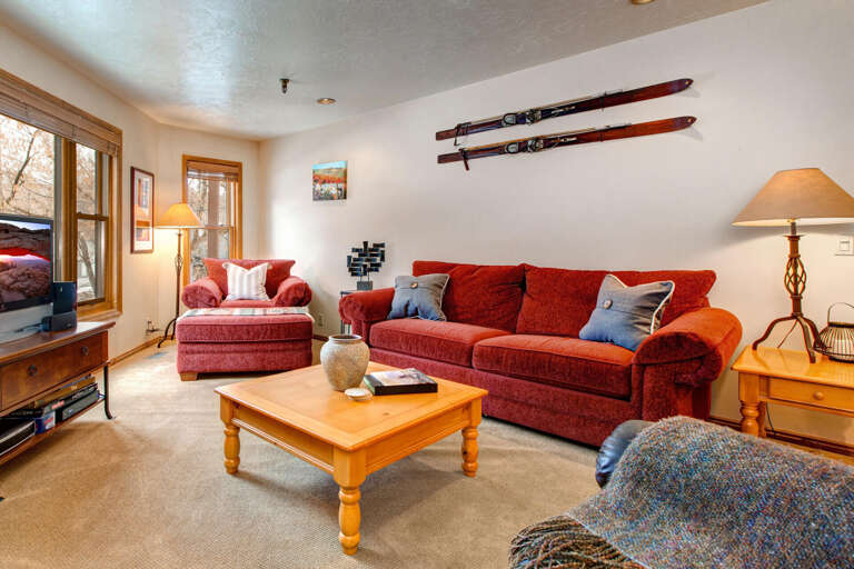 Cozy ambiance with a wood burning fireplace and comfy sofa chairs.