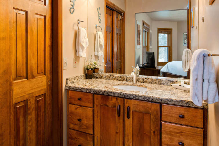 Queen bedroom with ensuite bathroom, perfect for a relaxing retreat.