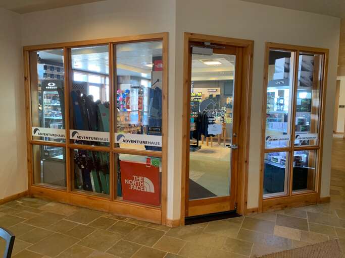 This entrance welcomes you to the resort's on-site retail shops, where you'll find outdoor gear, apparel, and adventure essentials just steps from your accommodations.