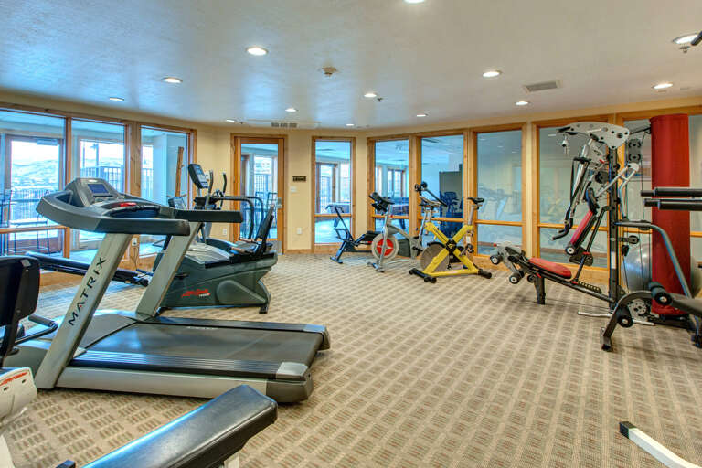Stay on top of your fitness routine in this bright, fully-equipped gym with mountain views. Treadmills, bikes, and strength machines await your morning workout.