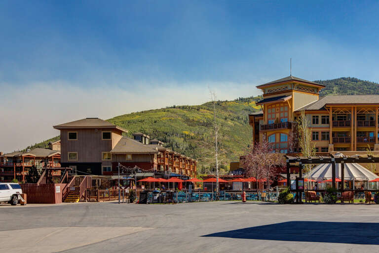 The property sits in a scenic mountain town setting with shopping and dining in the surrounding area, offering convenient access to local amenities and natural beauty.