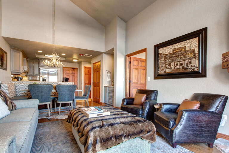 Westgate 3901A: Cozy sofa set near dining table, with a peek of the bedroom.