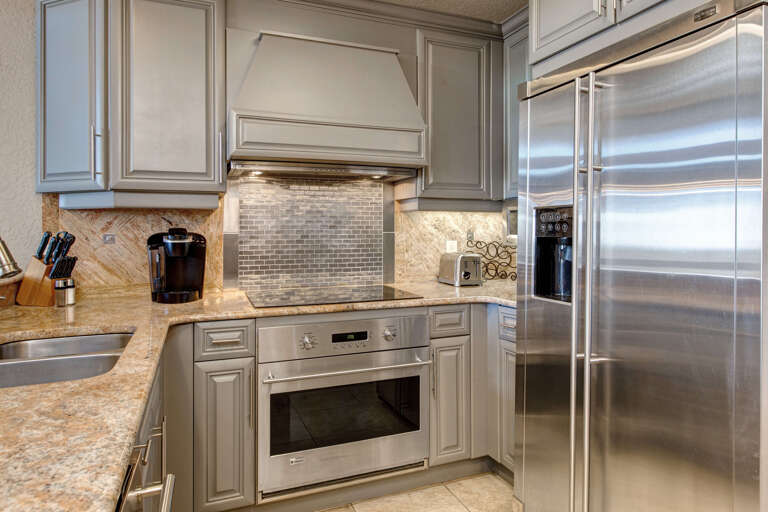 Westgate 3901A: Modern appliances and ample storage in sleek kitchen design.