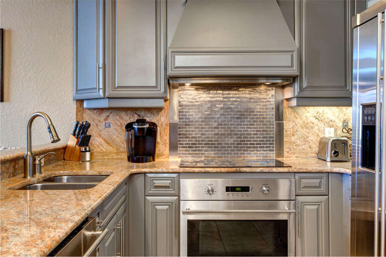 Westgate 3901A: Modern appliances and ample storage in sleek kitchen design.