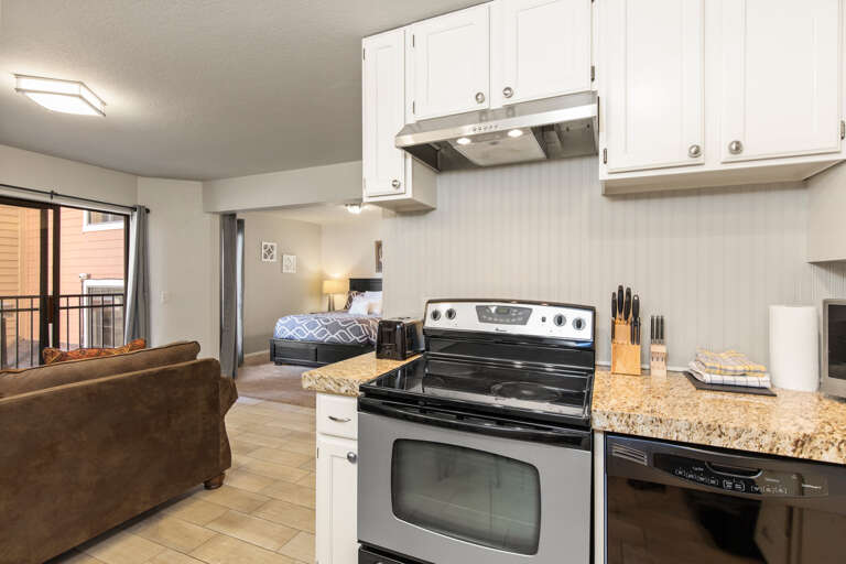 Modern electric range adding style and functionality to the space. Modern electric range adding style and functionality to the space.
