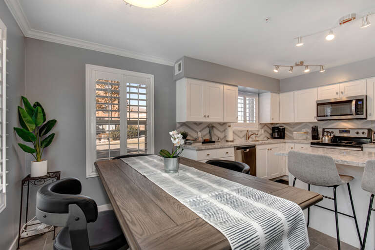 Inviting dining table in a cozy kitchen setting.