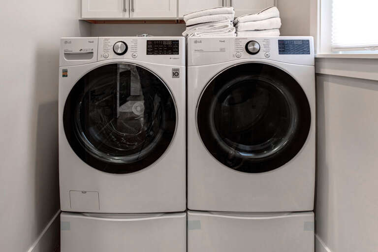 Keep your wardrobe fresh throughout your stay with a full-sized washer and dryer at your fingertips, complete with fluffy towels stacked and ready.