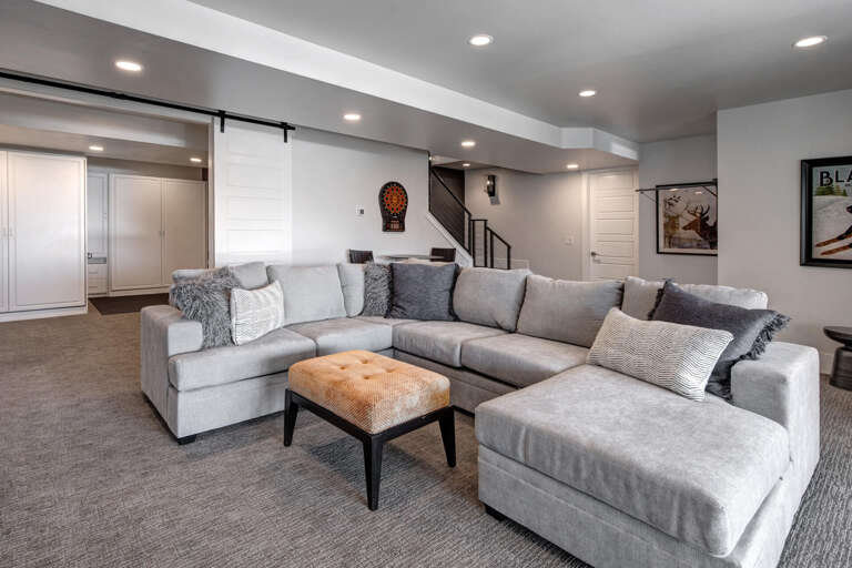 Sink into this spacious sectional and make yourself at home in your private living area. Soft textures and warm lighting create the perfect spot to unwind after a day of exploring.