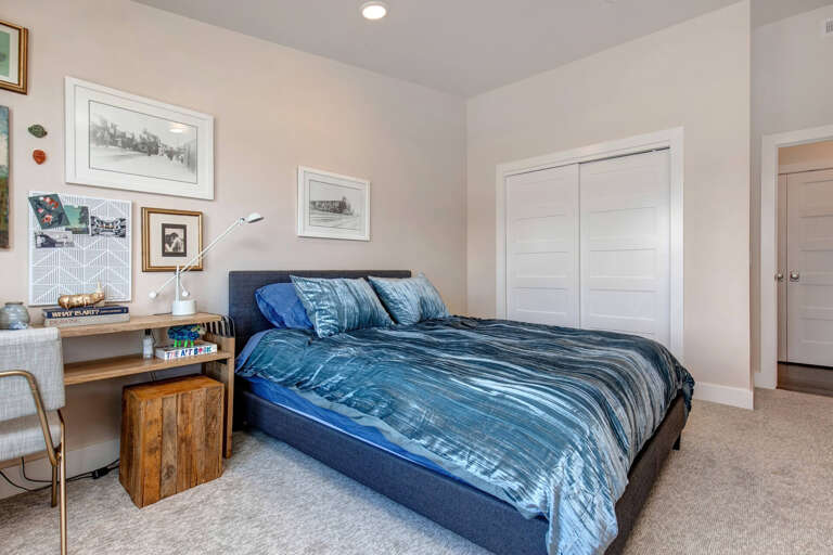 Cozy corner with a comfortable bed and spacious closet. Cozy corner with a comfortable bed and spacious closet.
