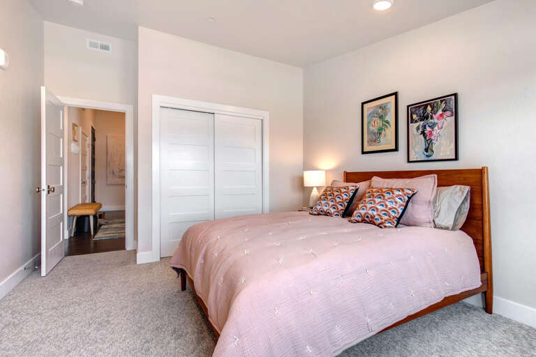 Cozy corner with a comfortable bed and spacious closet. Cozy corner with a comfortable bed and spacious closet.