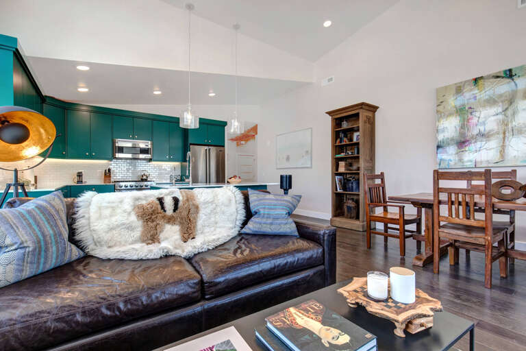 Cozy sofa set with a view of the kitchen in the background. Cozy sofa set with a view of the kitchen in the background.