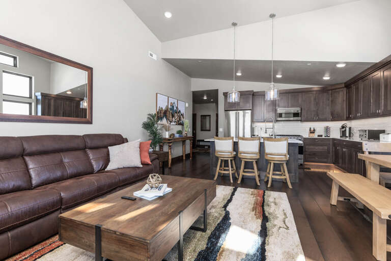 Cozy sofa set with a glimpse of the kitchen. Cozy sofa set with a glimpse of the kitchen.