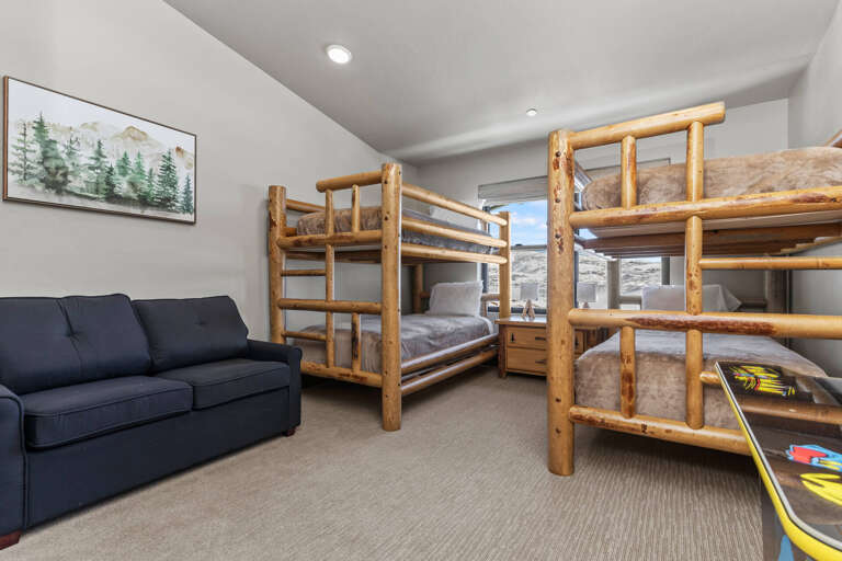 Cozy space with two bunks and a comfy sofa. Cozy space with two bunks and a comfy sofa.