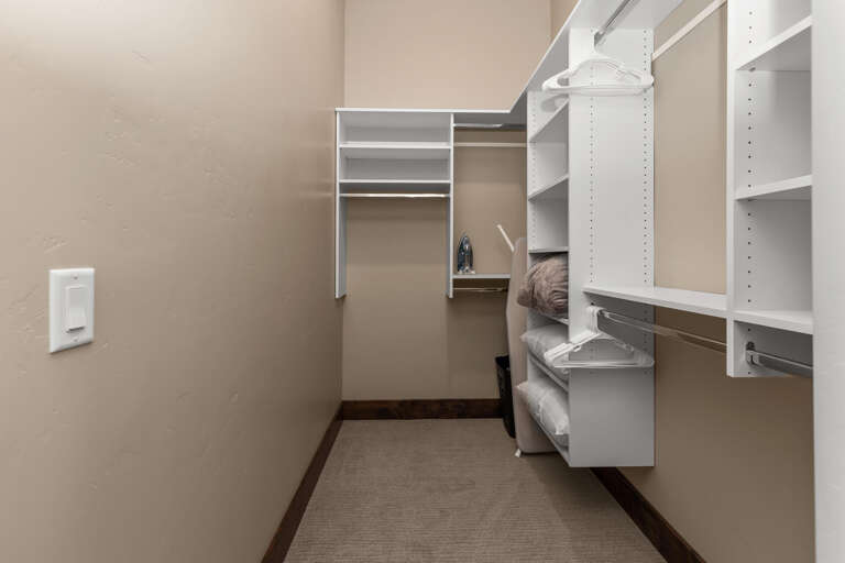 Organized shelves and boxes neatly arranged in the spacious storage area.