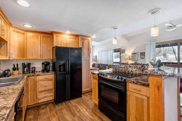 Fully Equipped Kitchen: Modern Appliances and ample storage